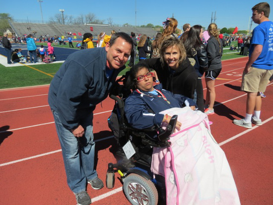 Dr. Packard and Corinne Packard with Special Olympian - Do Good Things